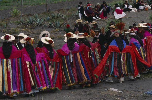 ECUADOR, Tungurahua, Salasaca, Corpus Christi dancers in colourful costume during celebrations held in June in honour of the Eucharist.