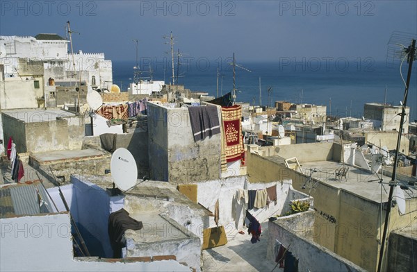 MOROCCO, Tangier, View over rooftops with satelite dishes visible