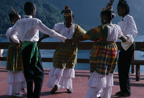 ST LUCIA, Customs, Children performing traditional dance in costume.