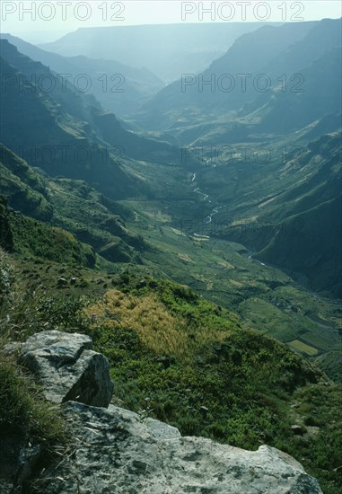 ETHIOPIA, Dese , View from Dese towards Wegel Tena Woilo Province over mountains into green valley.