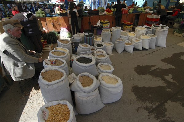 ROMANIA, Tulcea, Tulcea, Sacks of lentils pulses rice and wheat at the fresh produce market