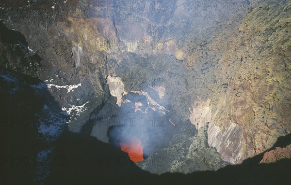 CHILE, Los Lagos, Volcan Villarrica, View down to red hot lava in crater of volcano in the lake District.