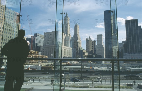 USA, New York, Manhattan, People looking over Ground Zero during reconstruction of the World Trade Center