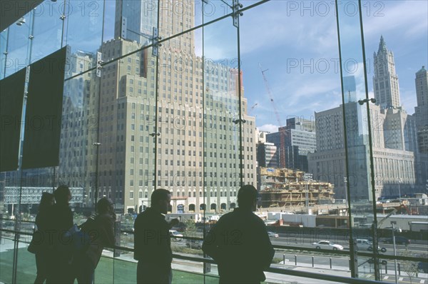 USA, New York, Manhattan, People looking over Ground Zero during reconstruction of the World Trade Center