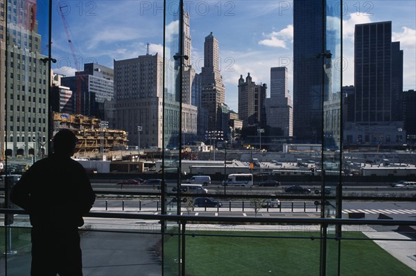 USA, New York, Manhattan, People looking over Ground Zero during reconstruction of the World Trade Center