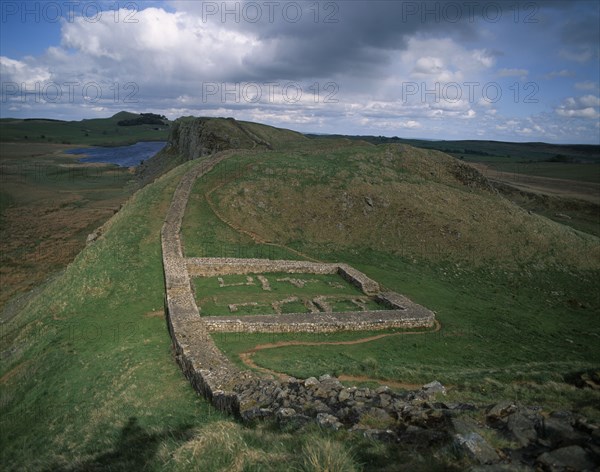 ENGLAND, Northumberland, Hadrians Wall, Mile tower along section of ruined wall at Peel Crags