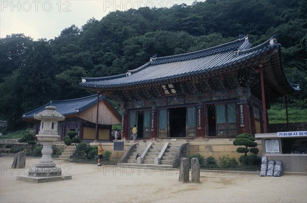 SOUTH KOREA, Kangwon, Soraksan Nat. Park, Shinhungsa Temple.  Exterior of Zen meditation temple first built in 653 AD.  Rebuilt in 1645 and again after the Korean War after twice being burnt to the ground.