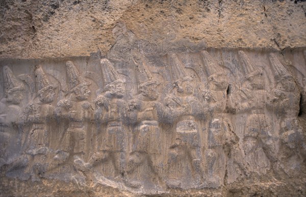 TURKEY, Central Anatolia, Corum, Hattusas.  Ancient site of Hittite capital.  Stone relief carving in the Great Temple dedicated to the storm god Teshub and the sun goddess Hebut.