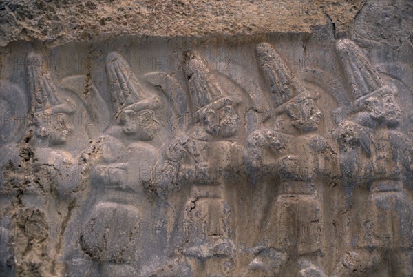 TURKEY, Central Anatolia, Corum, Hattusas.  Ancient site of Hittite capital.  Stone relief carving in the Great Temple dedicated to the storm god Teshub and the sun goddess Hebut.