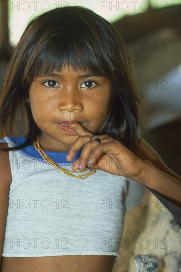 BRAZIL, Amazonas, Comunidade Sao Benedito, "Portrait of Satere Maue Indian girl living beside the Rio Arua, an affluent of the Rio Maues."