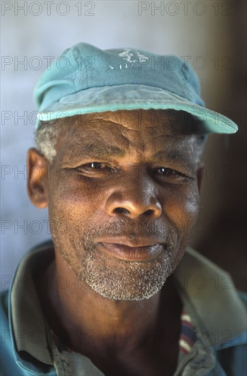 SOUTH AFRICA, Western Cape, Paarl, Portrait of male agricultural worker at Fairview goats cheese and wine estate