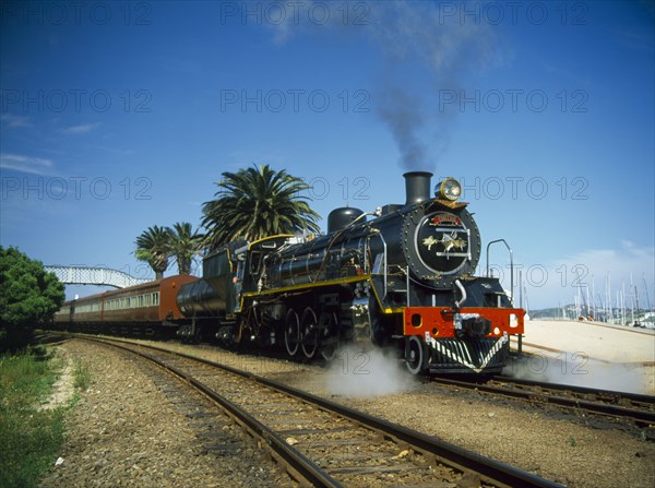SOUTH AFRICA, Western Cape, Knysna, Tootsie engine of the National Train Collection travelling between George and Knysna.