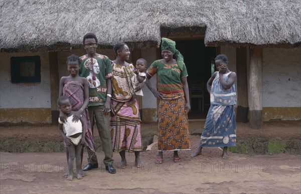 CONGO, Tribal People, Portrait of family group.  Man with two wives and three children.