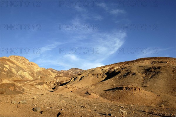 USA, California, Death Valley, View toward layered sculpted rock hills