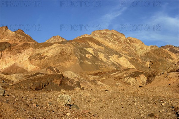 USA, California, Death Valley, View over layered sculpted rock hills in the golden afternoon sun