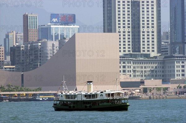 HONG KONG, Victoria Harbour, Star Ferry crossing the Harbour with the city architecture behind