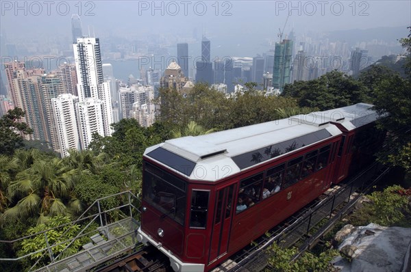 HONG KONG, General, Hillside cable car carriage overlooking the cityscape below