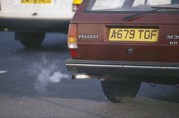 ENVIRONMENT, Pollution, Air, Close up view of car exhaust with fumes comming out