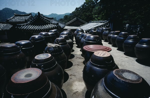 SOUTH KOREA, South Kyongsan, Haeinsa, Kimchi pots containing pickled cabbage eaten as part of every meal outside Haeinsa Temple.