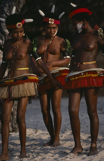 PAPUA NEW GUINEA, Trobriand Islands, Girls dressed for traditional dance