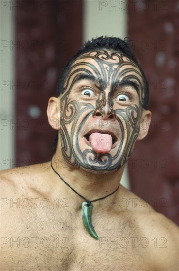 HAWAII, People, Polynesian Cultural Centre.  Man demonstrating traditional New Zealand Maori greeting. PLEASE CREDIT POLYNESIAN CULTURAL CENTRE