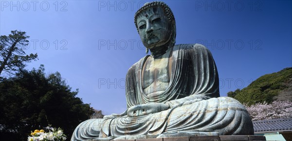 JAPAN, Honshu, Kamakura, Daibutsu or Great Buddha. Seated Buddha statue cast in bronze and measuring forty four feet tall and dating from 1252
