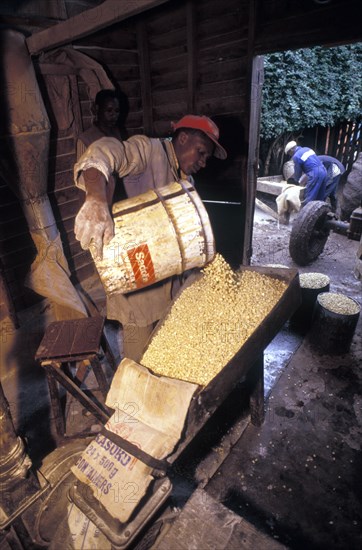 KENYA, Loitokitok, Maize meal being crushed in the town