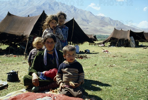 TURKEY, East, Nomadic Kurdish family outside tents in Eastern Turkey.