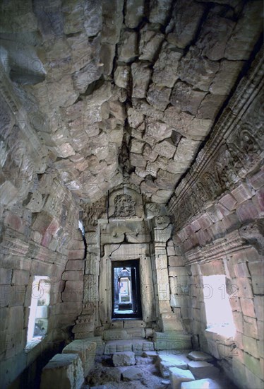 CAMBODIA, Angkor, Interior view of Ta Prohm 12th century Temple ruins