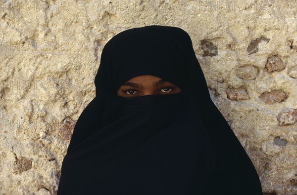 KENYA, Lamu Island, People, Portrait of veiled woman.