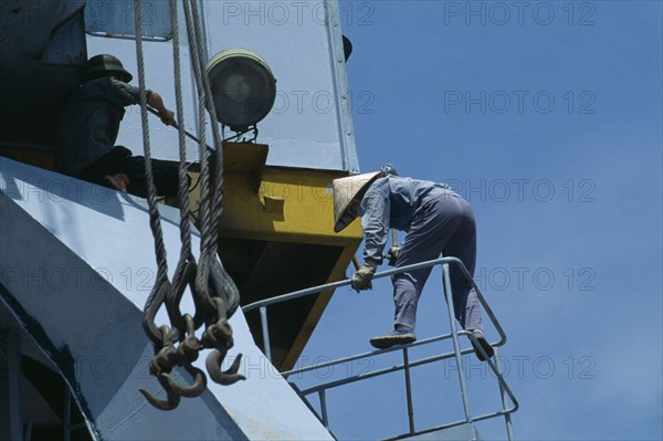 VIETNAM, North, Haiphong, Maintenance worker at Doan Xa container terminal.