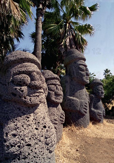 SOUTH KOREA, Cheju do Island, Tolharubang grandfather stones carved from lava rock which are guardians of the gates to Chejus ancient towns