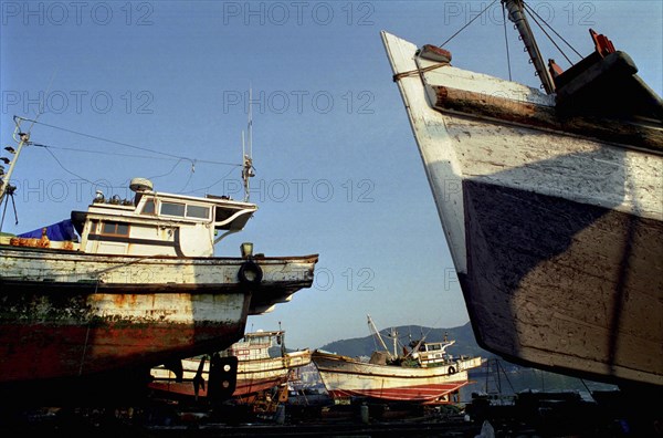 SOUTH KOREA, Pusan, View of ships in for repair at dry docks