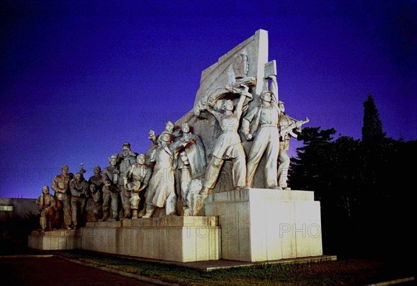 CHINA, Beijing, Tiananmen Square, View of the Monument to the Peoples Heroes illuminated at night