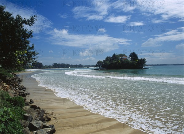 SRI LANKA, Taprobane Island, Also called Yakinige Duwa or Count de Maunys Island.  Shoreline and small islet with house amongst trees.