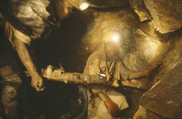 SOUTH AFRICA, Orange Free State, Miners working underground.