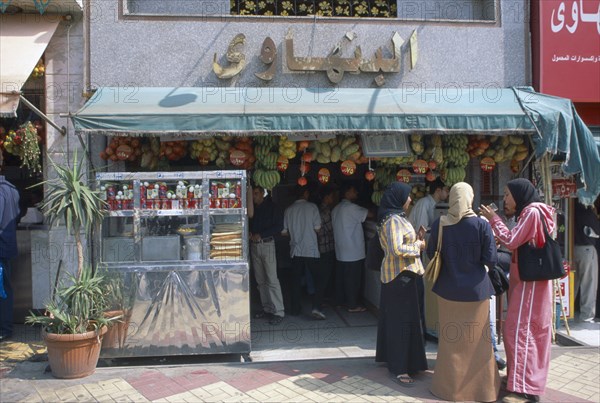 EGYPT, Cairo , Customers at juice bar.
