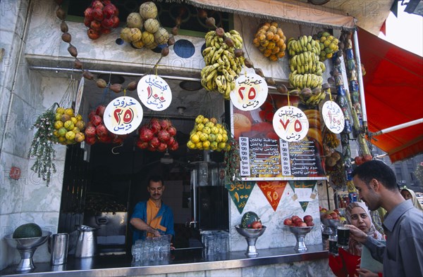 EGYPT, Cairo , Customers at juice bar.