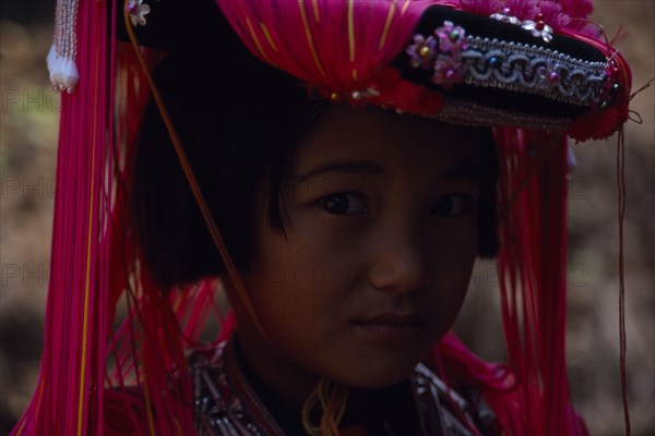 20044435 THAILAND North Baan Mai Suai Head and shoulders portrait of Lisu girl.