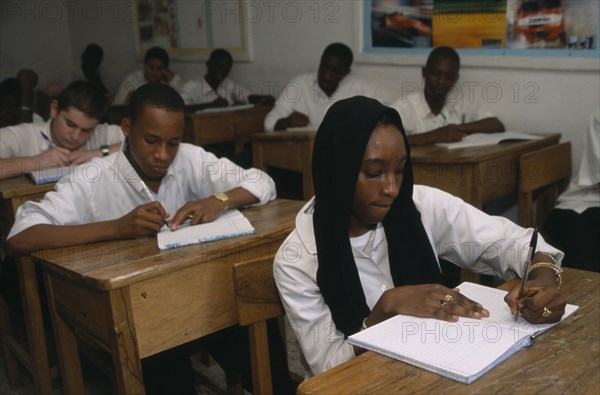 NIGERIA, Kano, Students sitting at desks in a Primary school