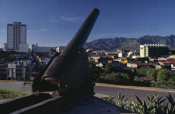 COSTA RICA, San Jose, View over city with old cannon in the foreground