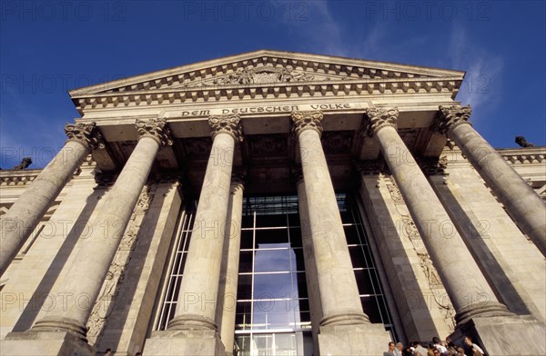 GERMANY, Berlin, Angled view looking up at the Reichstag columned facade