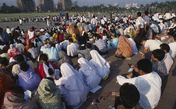 BANGLADESH, Dhaka, Crowds of Christian worshippers at Easter sunrise service at parliament building.