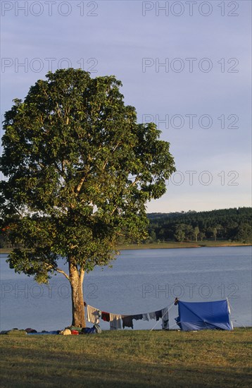 AUSTRALIA, Queensland, Camping, Campers by Lake Tinaroo on the Atherton Tableland south west of Cairns.