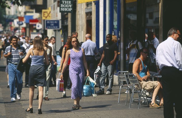 ENGLAND, London, Oxford Street.  Pedestrians and shoppers.