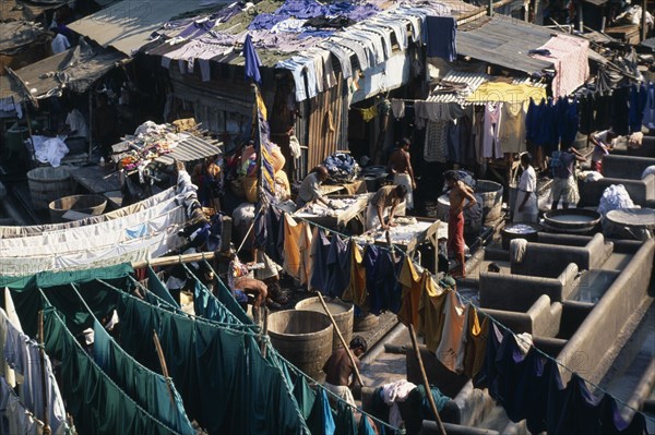 INDIA, Maharashtra, Mumbai, Mahalaxmi Dhobi Ghat. View over laundry with hanging clothes