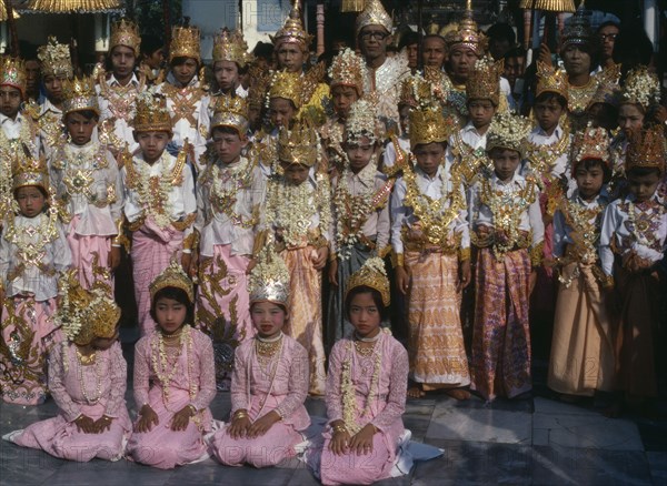 MYANMAR, Religion, Buddhism, Shwedagon Pagoda.  Initiation of novices monks and nuns at Shinpyu ceremony.