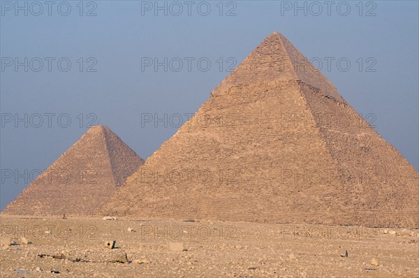 EGYPT, Cairo Area, Giza, Great Pyramid of Cheops or Khufu partly seen behind Pyramid of Chephren also known as Khafre or Khephren.