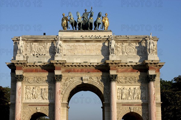 FRANCE, Ile de France, Paris, View of the Arc de Triomphe du Carrousel triumphal arch with equestrian statues atop