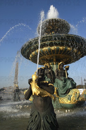 FRANCE, Ile de France, Paris, Foutain in the Place de la Concorde with the Luxor obelisk in the background